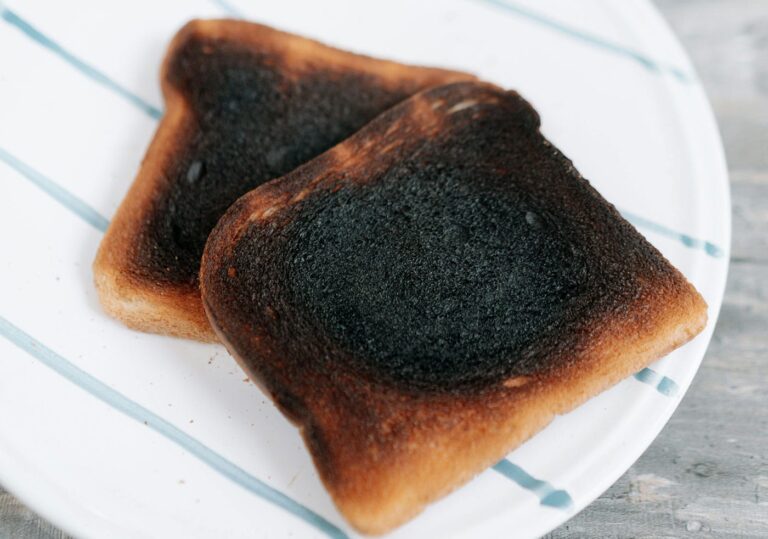 An image of burnt toast as a visual warning not to over-index your budget on paid marketing only lest you burn out your budget before hitting your true potential growth.