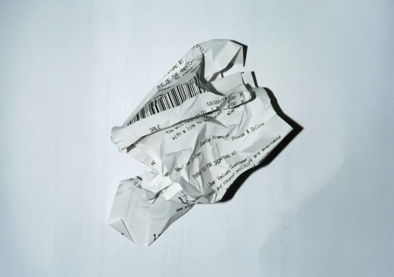 The photo of a crumpled receipt to represent the fact that B2B sales are not as easy to refund as normal consumer purchases.